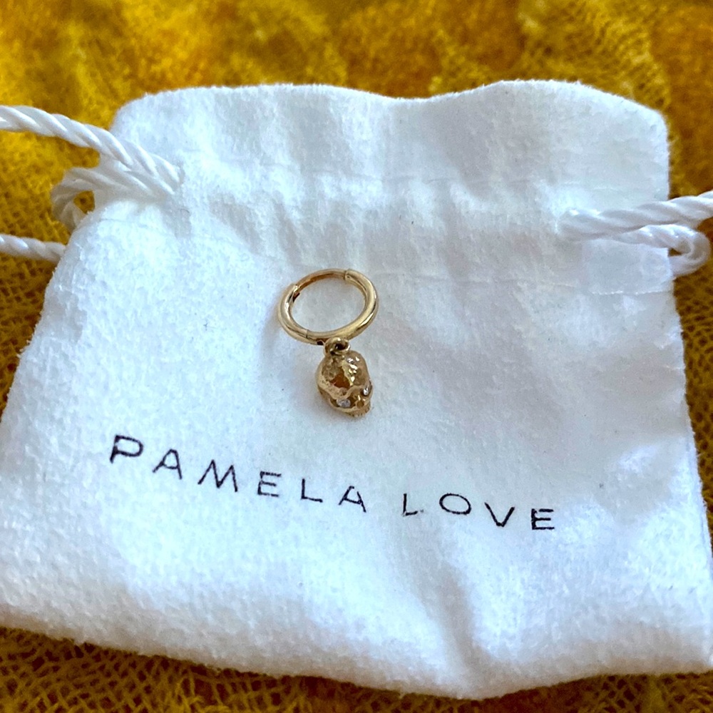 Pamela love diamond eyes skull huggie